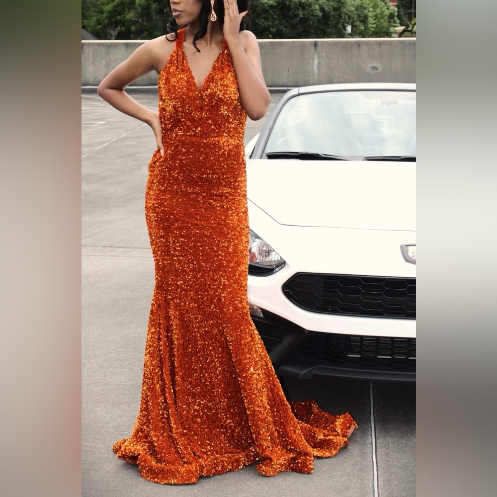 Morgan & Co Elegant Orange Sequin Evening Gown